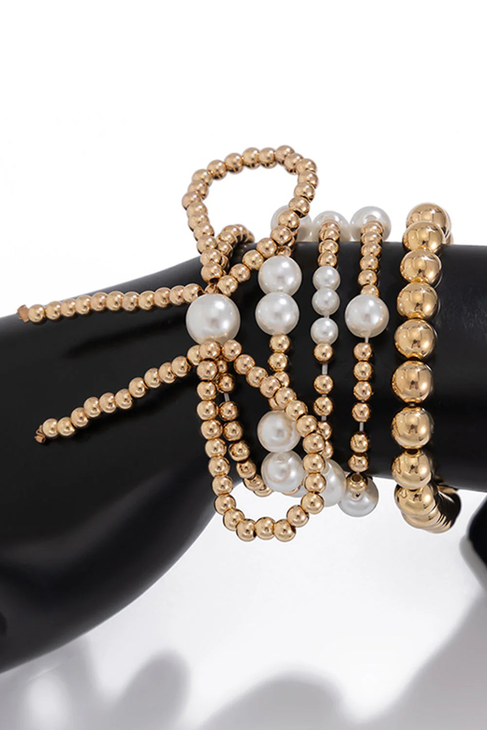 Set di Bracciali Multistrato con Fiocco Dorato e Perle - Image 5